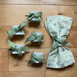 set of six porcelain napkin rings with sage green ribbon